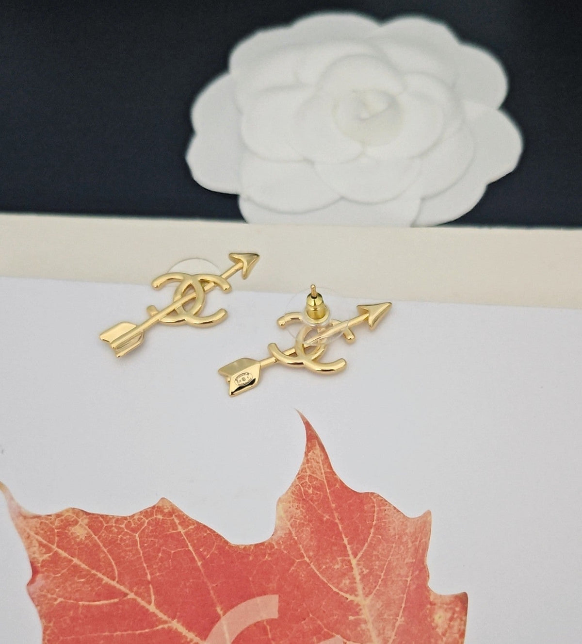 Martin Graham stud earrings in polished metal-tone – styled product view