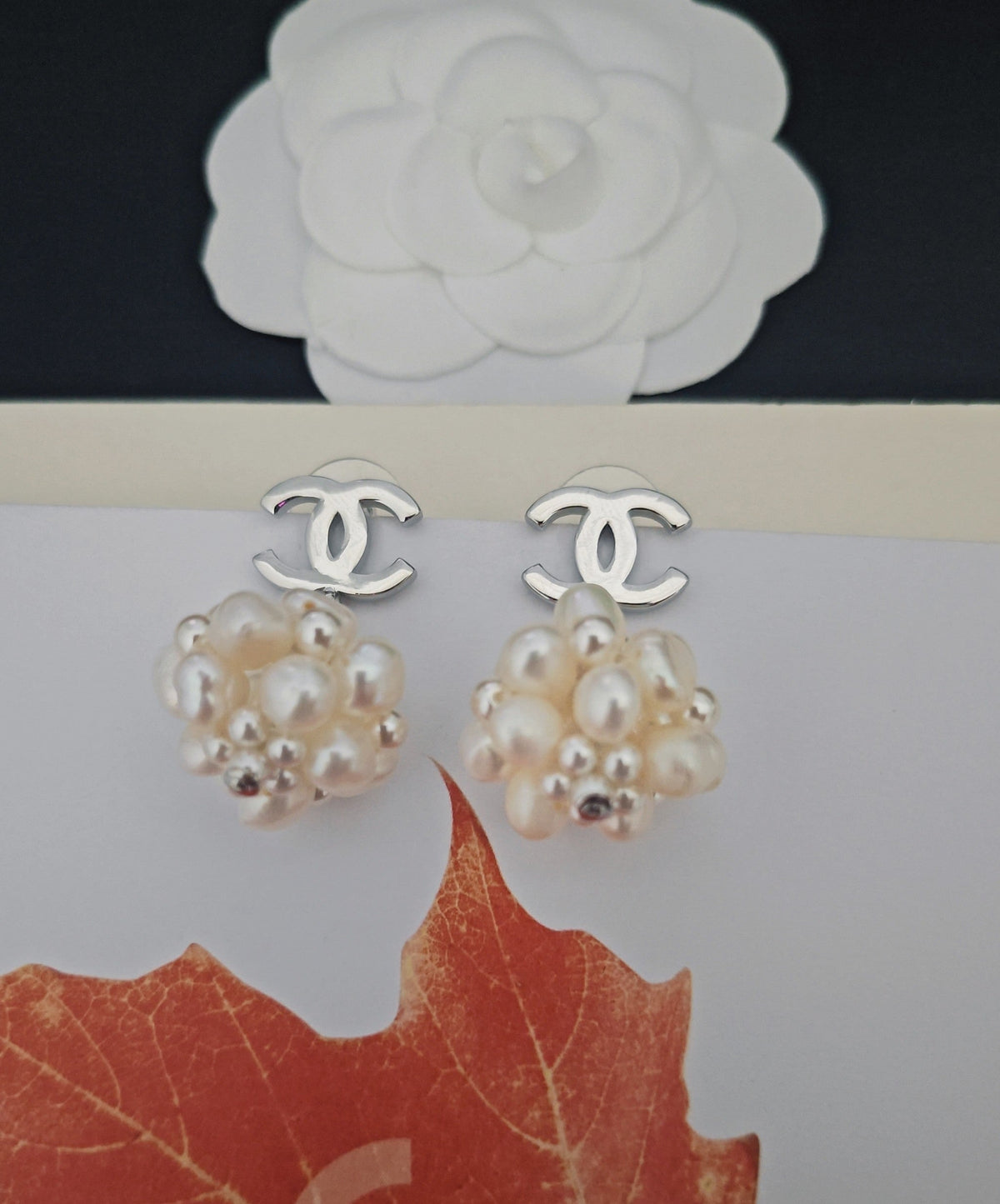 Martin Graham earrings in polished metal-tone – close-up detail