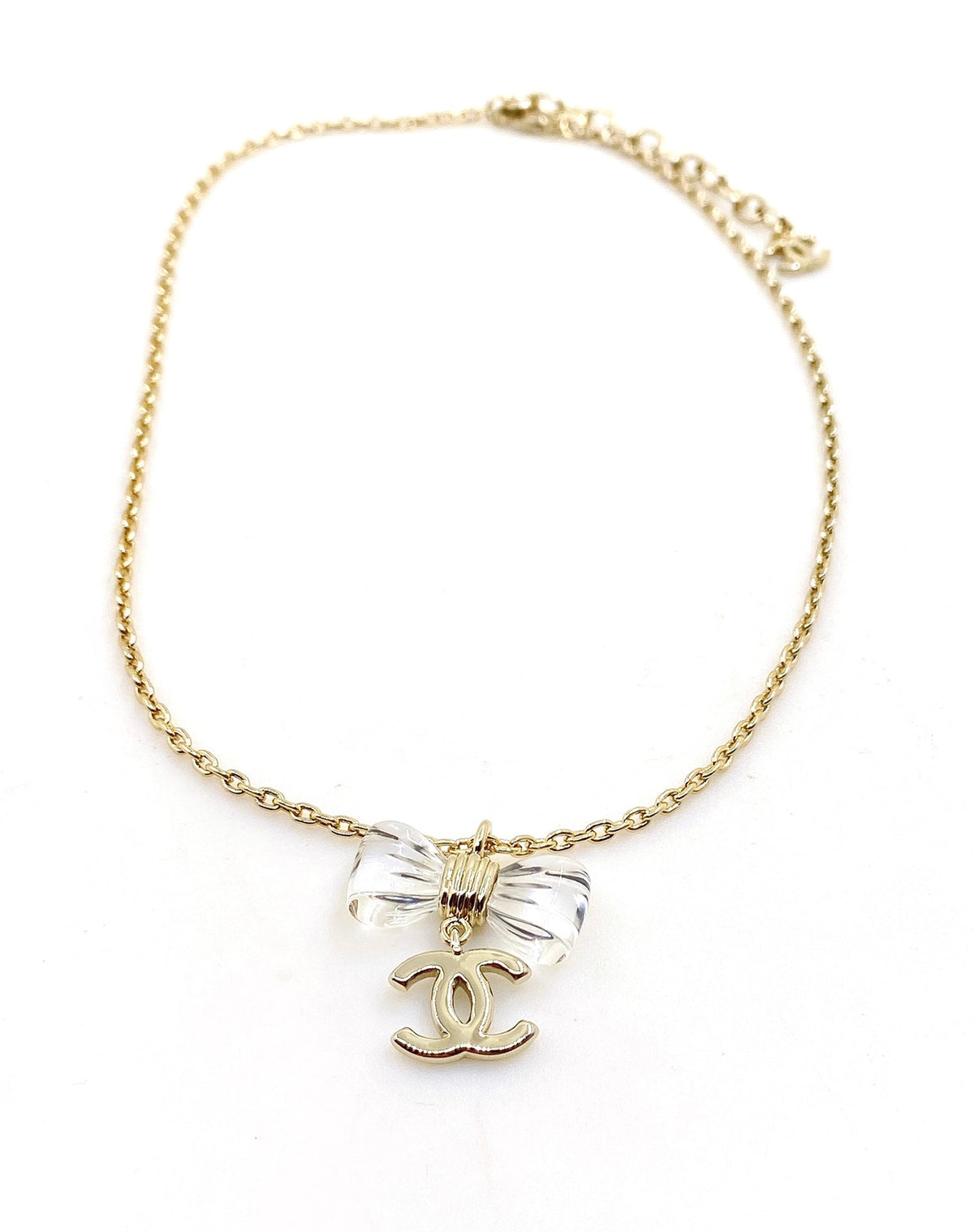 Martin Graham pendant necklace in polished metal-tone – side detail