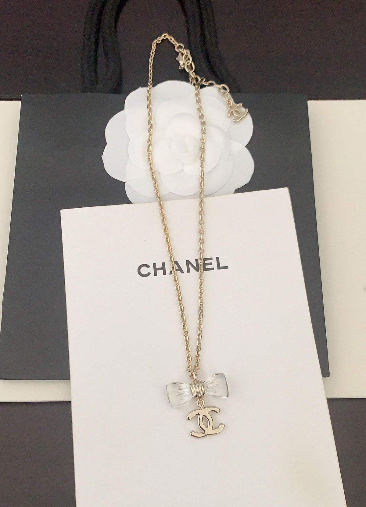 Martin Graham pendant necklace in polished metal-tone – detail view