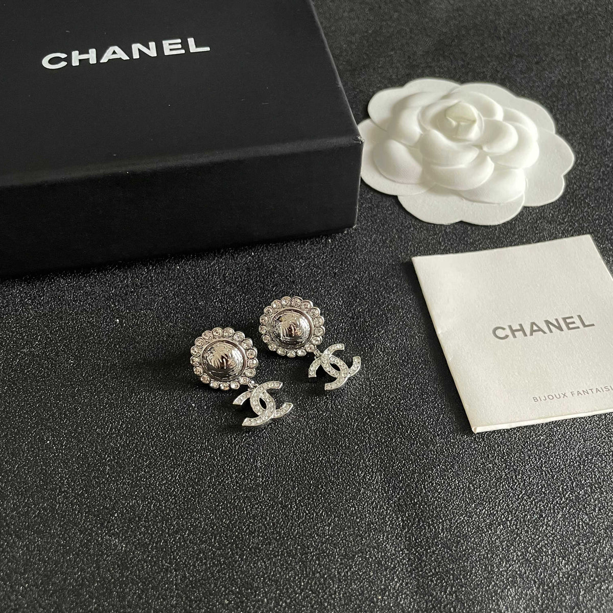 Martin Graham stud earrings in polished metal-tone – styled product view