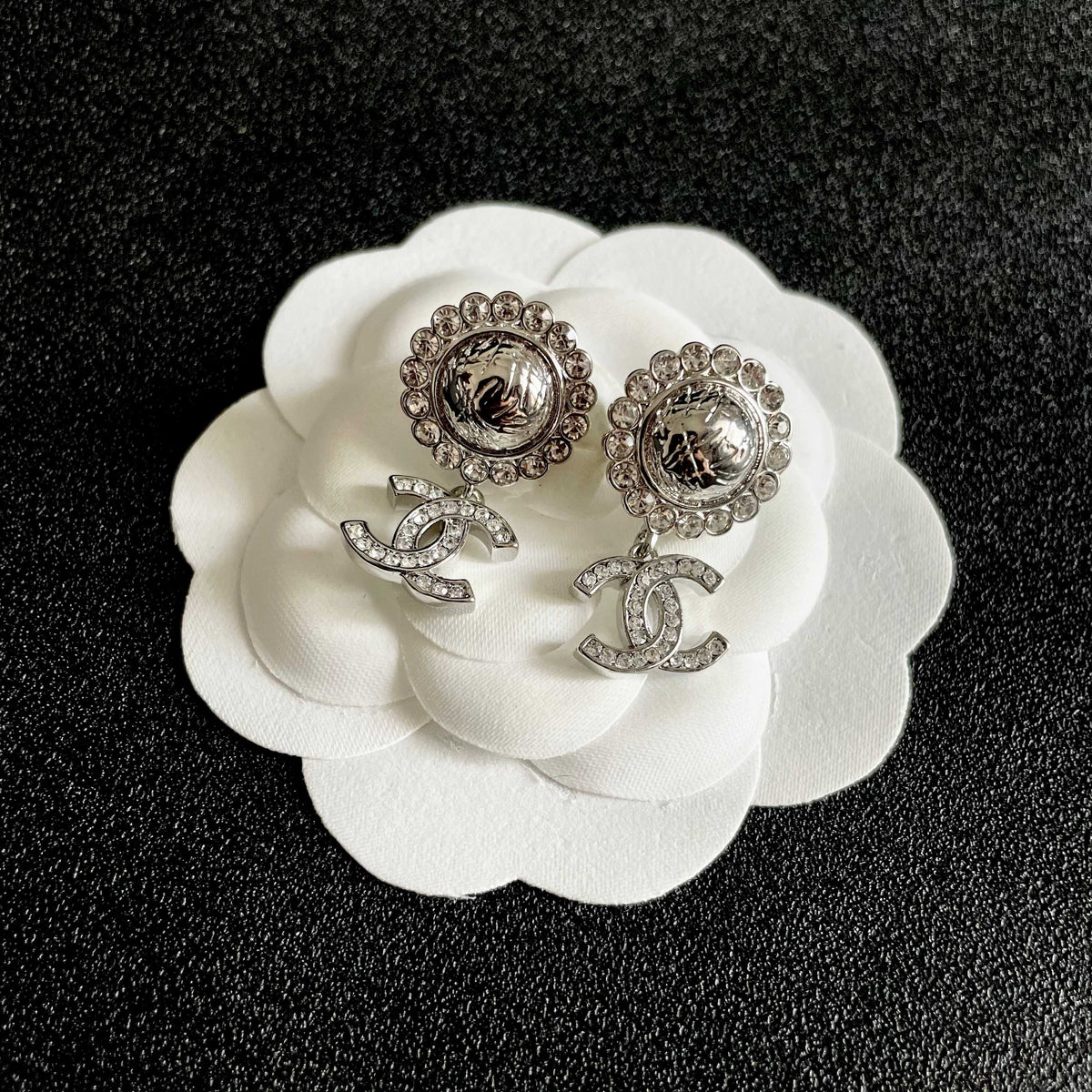 Martin Graham stud earrings in polished metal-tone – front product view