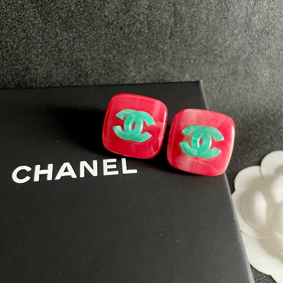 Martin Graham stud earrings in polished metal-tone – detail view