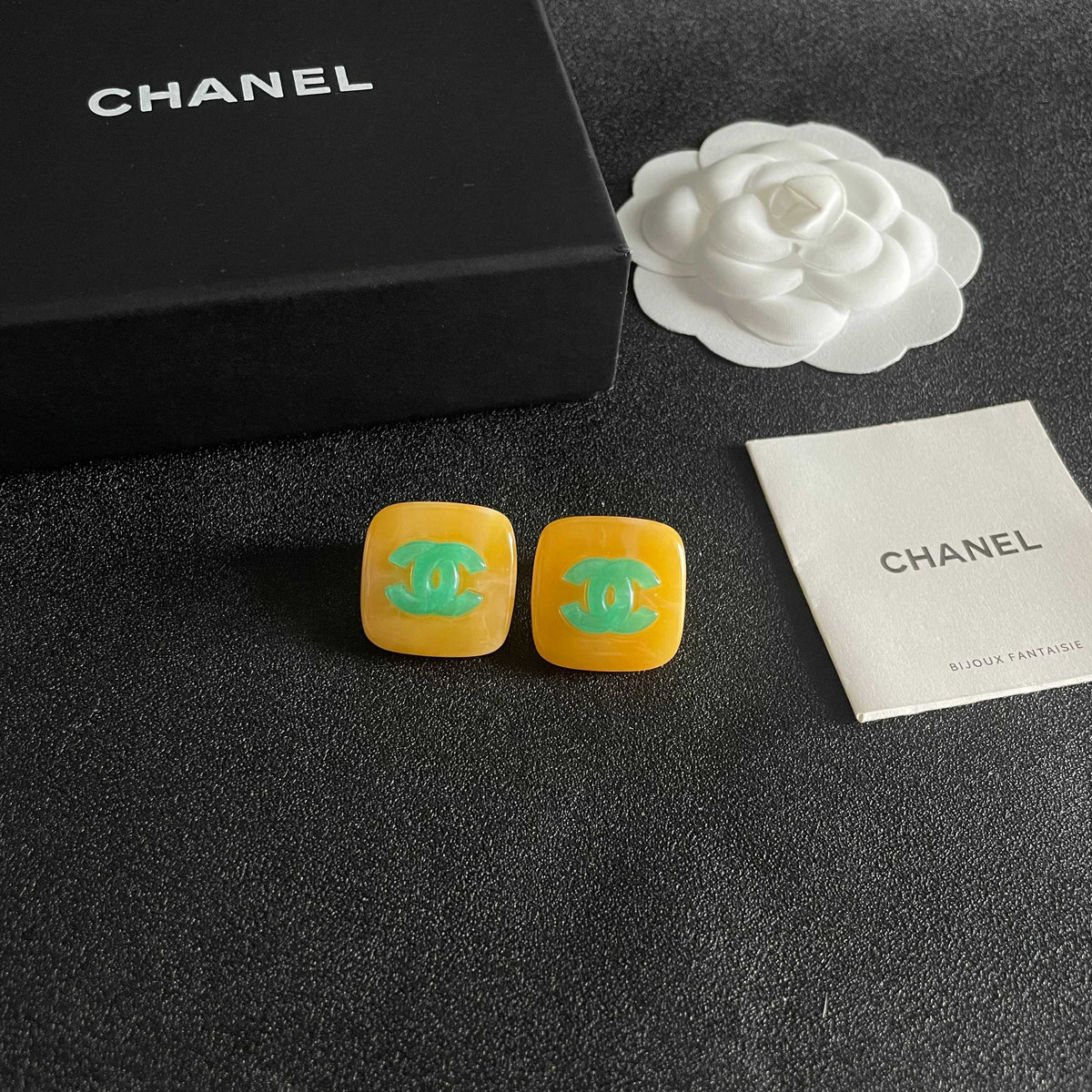 Martin Graham stud earrings in polished metal-tone – styled product view