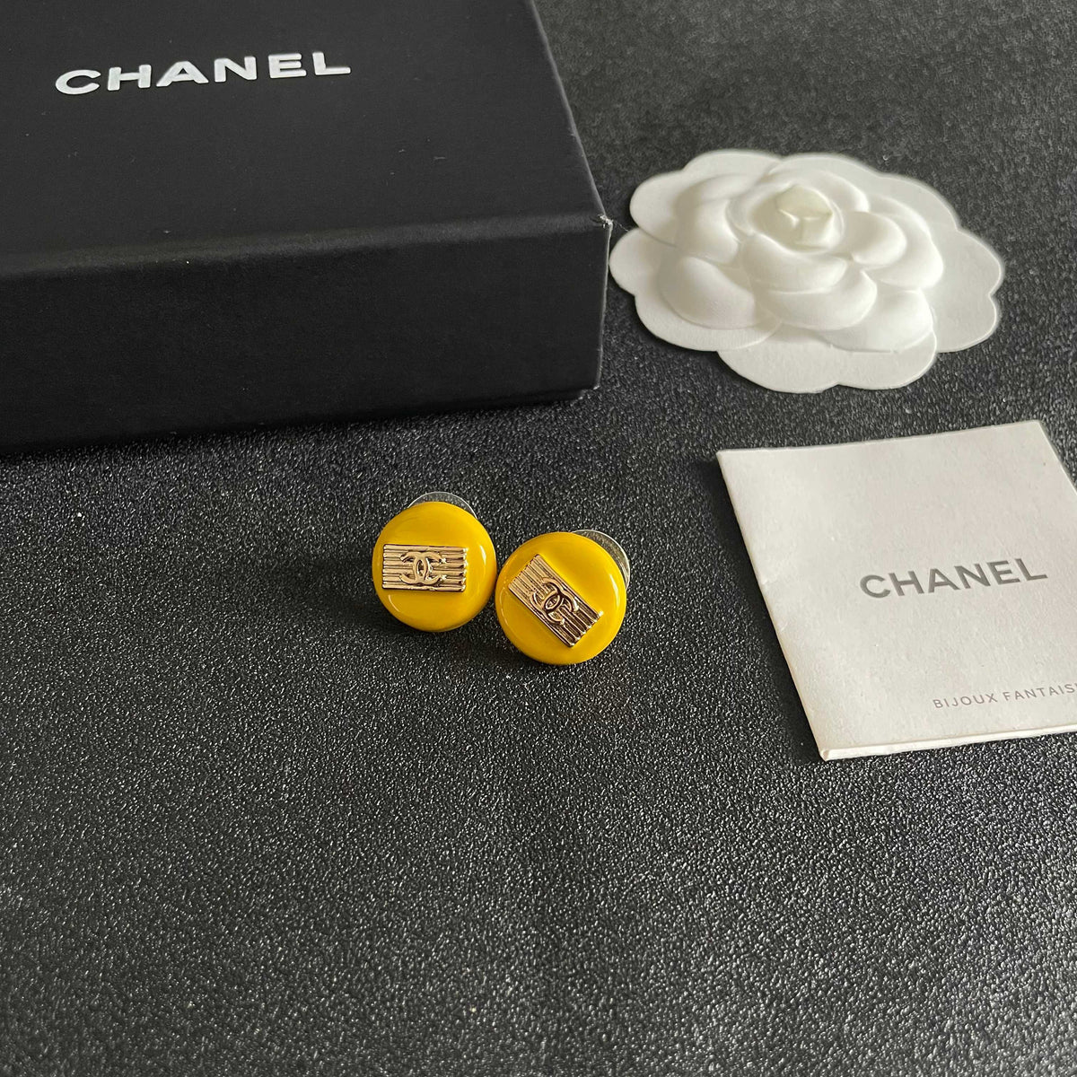 Martin Graham stud earrings in polished metal-tone – styled product view