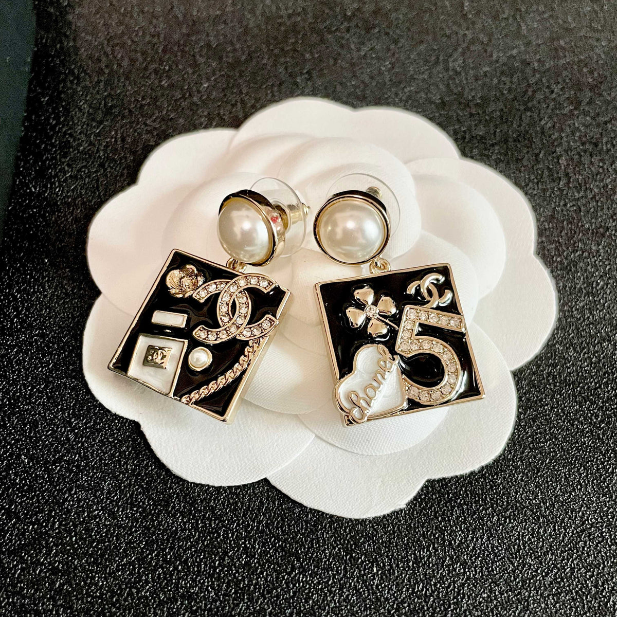 Martin Graham earrings in polished metal-tone – front product view