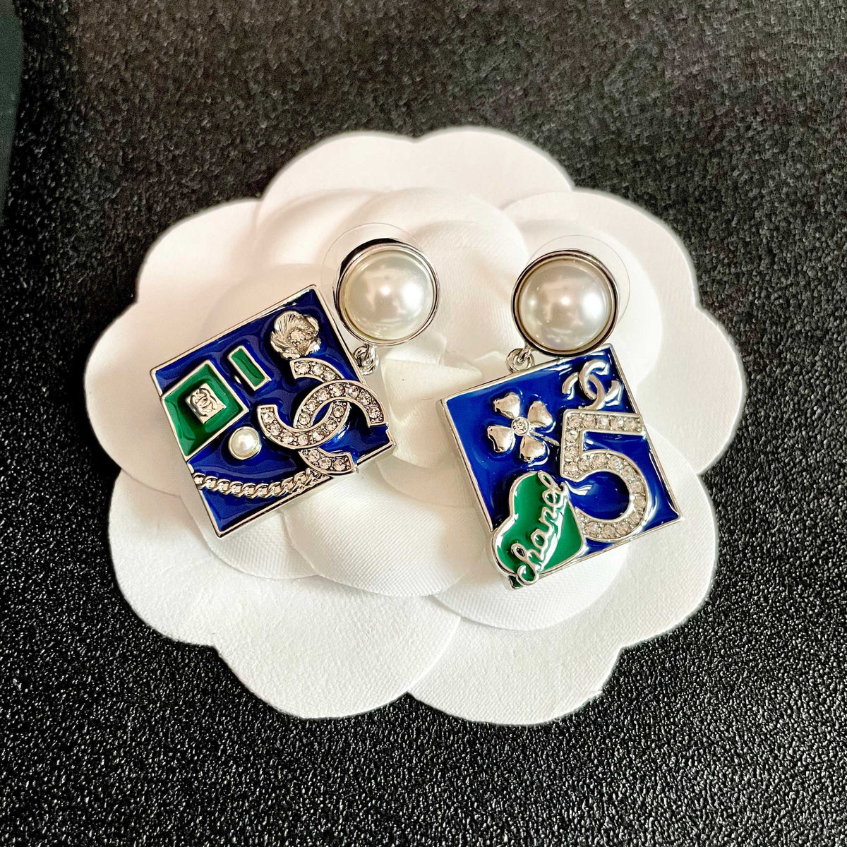 Martin Graham earrings in polished metal-tone – front product view