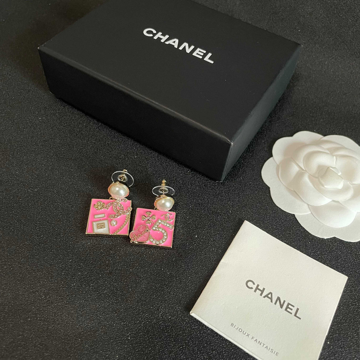 Martin Graham earrings in polished metal-tone – close-up detail