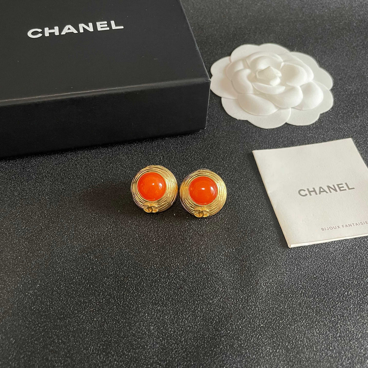 Martin Graham stud earrings in polished metal-tone – styled product view