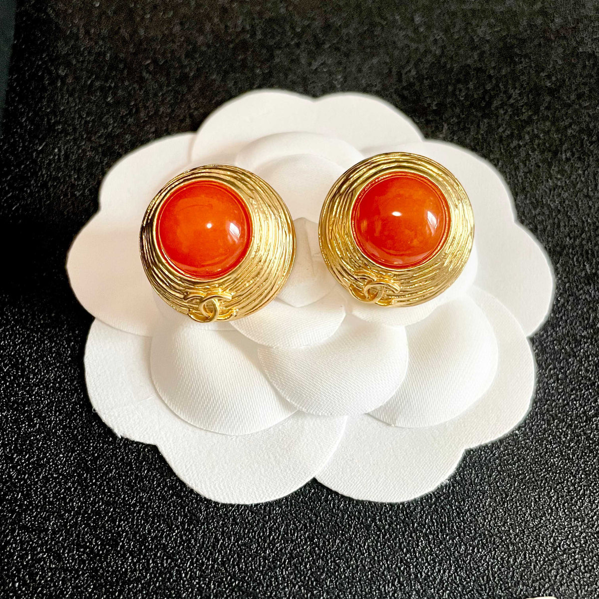 Martin Graham stud earrings in polished metal-tone – front product view