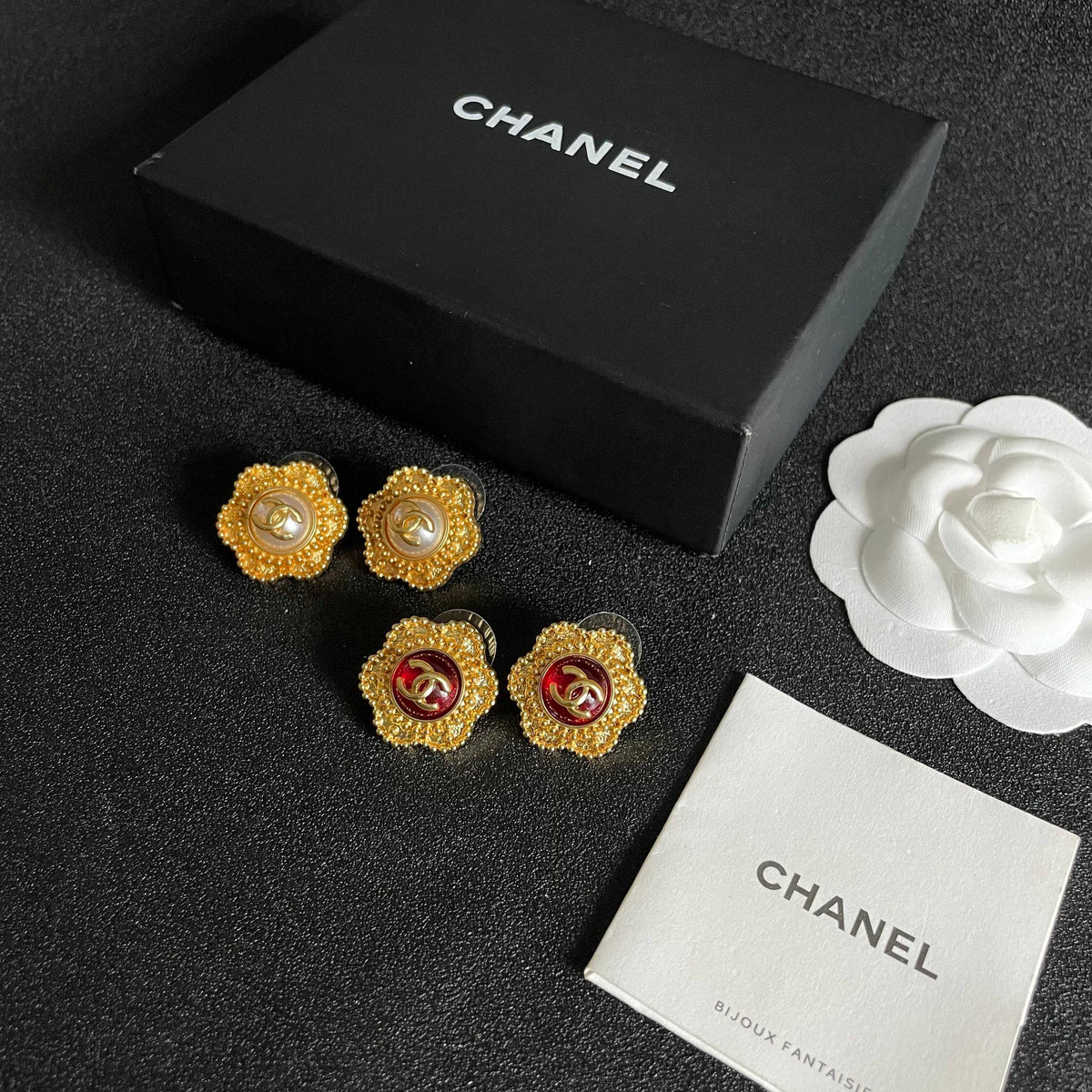 Martin Graham stud earrings in polished metal-tone – side detail