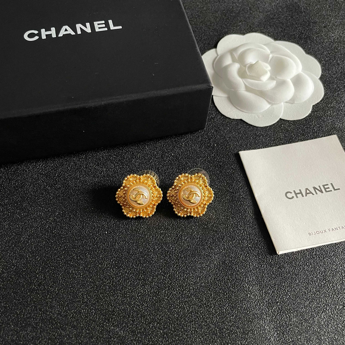 Martin Graham stud earrings in polished metal-tone – styled product view