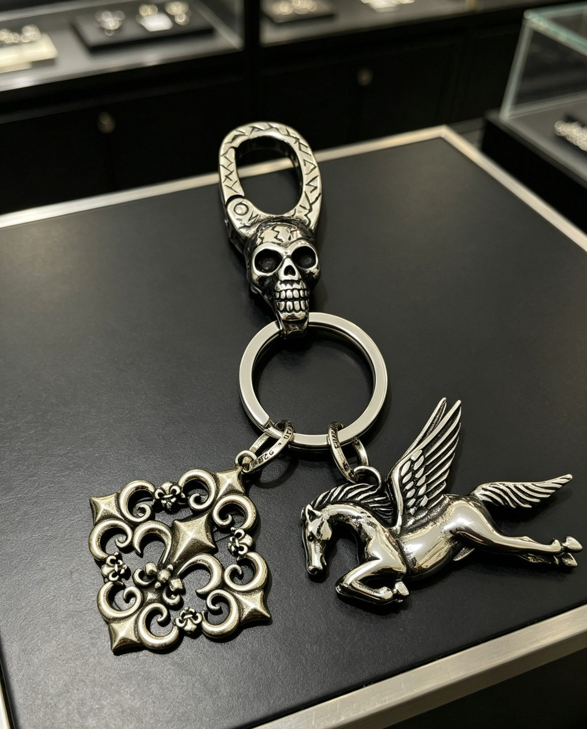Martin Graham keychain in polished metal-tone – close-up detail