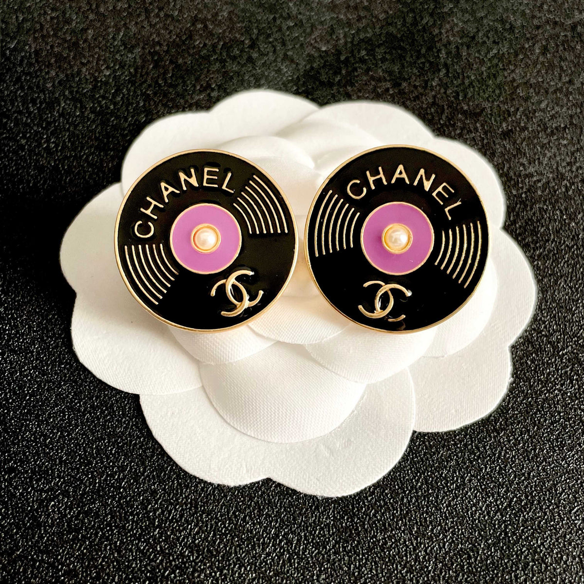 Martin Graham stud earrings in polished metal-tone – front product view