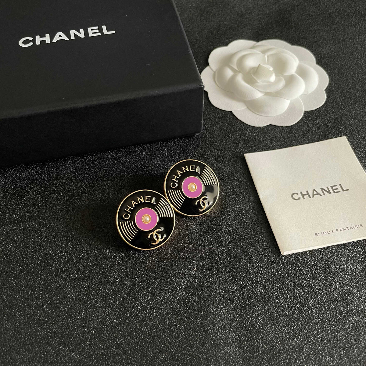Martin Graham stud earrings in polished metal-tone – styled product view