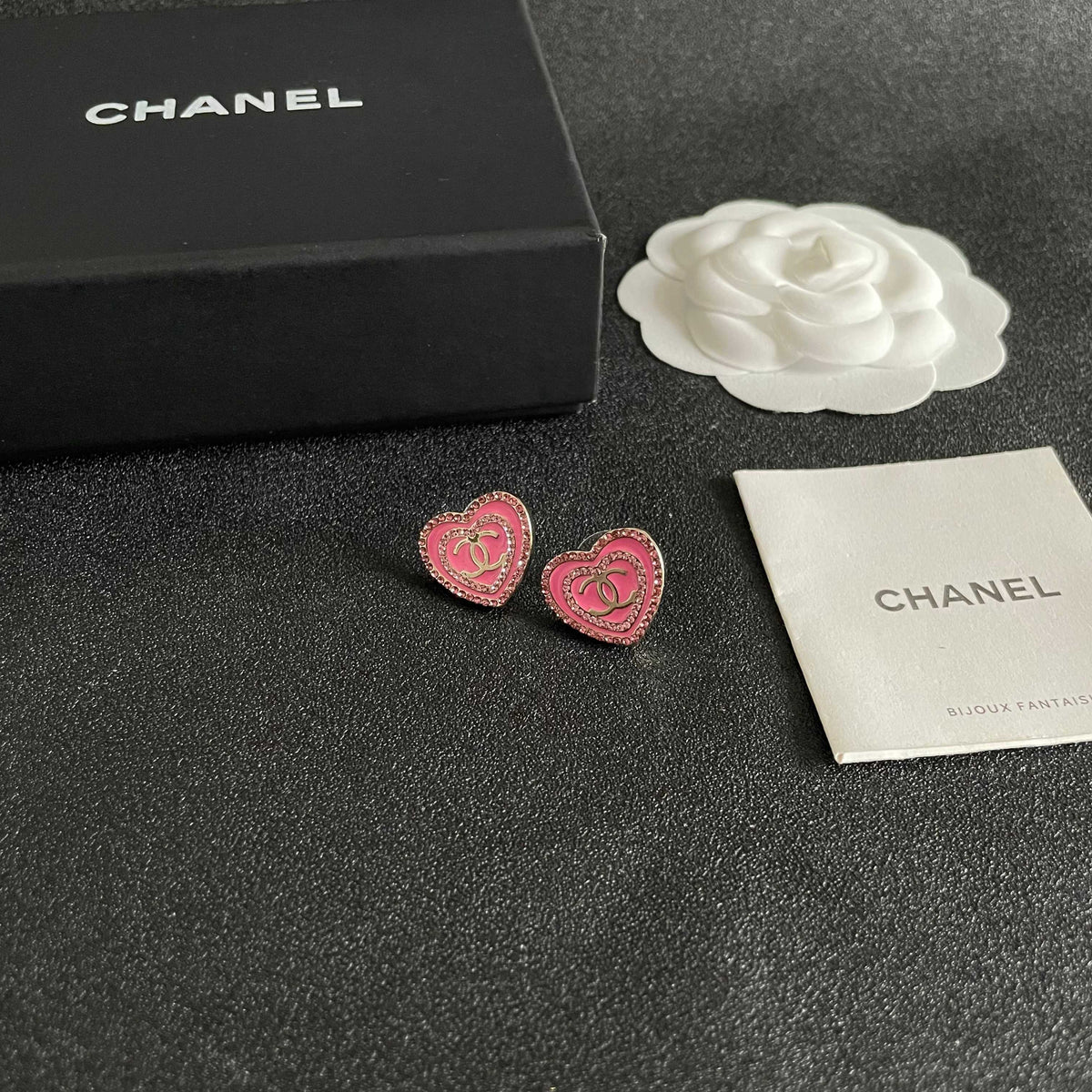 Martin Graham stud earrings in polished metal-tone – styled product view