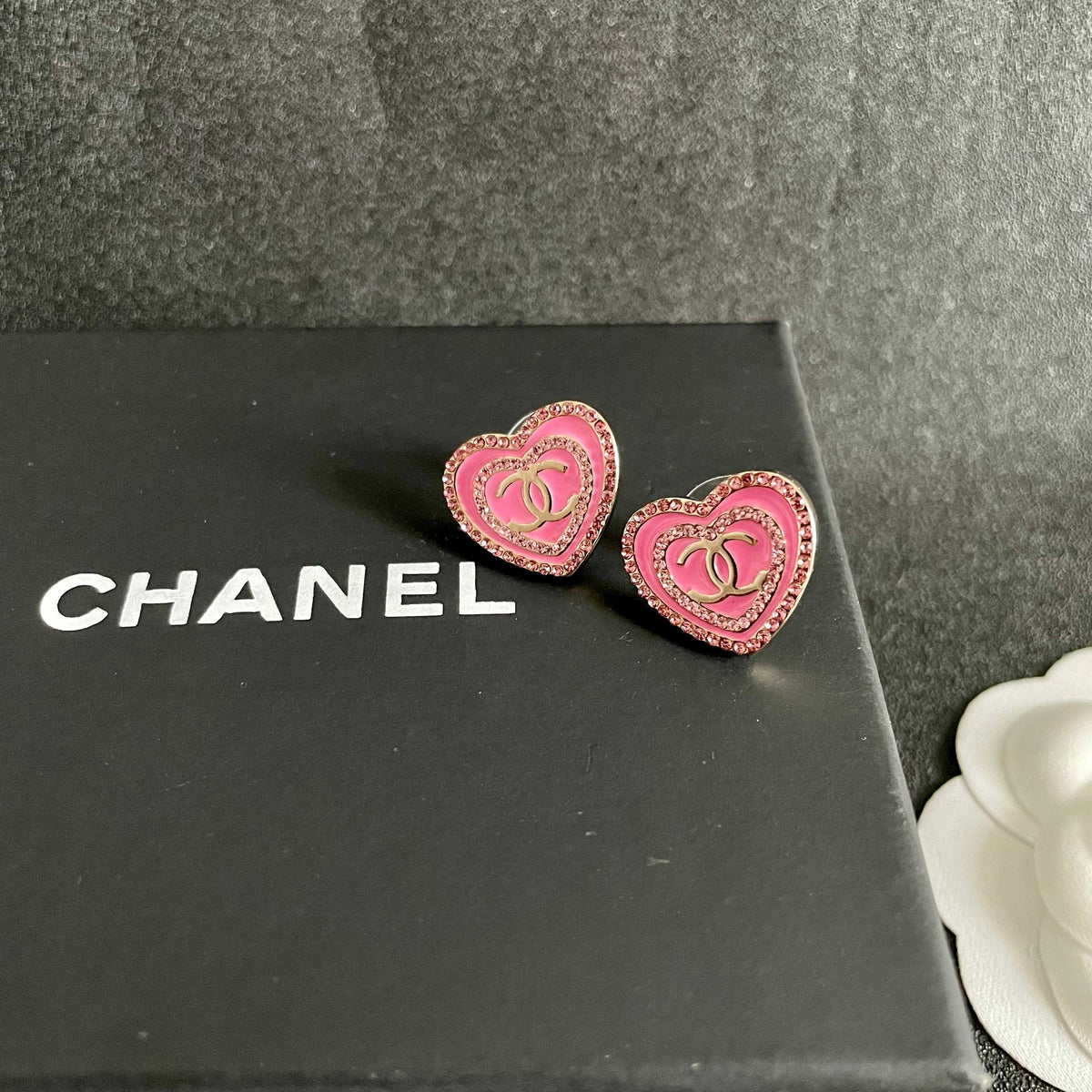 Martin Graham stud earrings in polished metal-tone – detail view