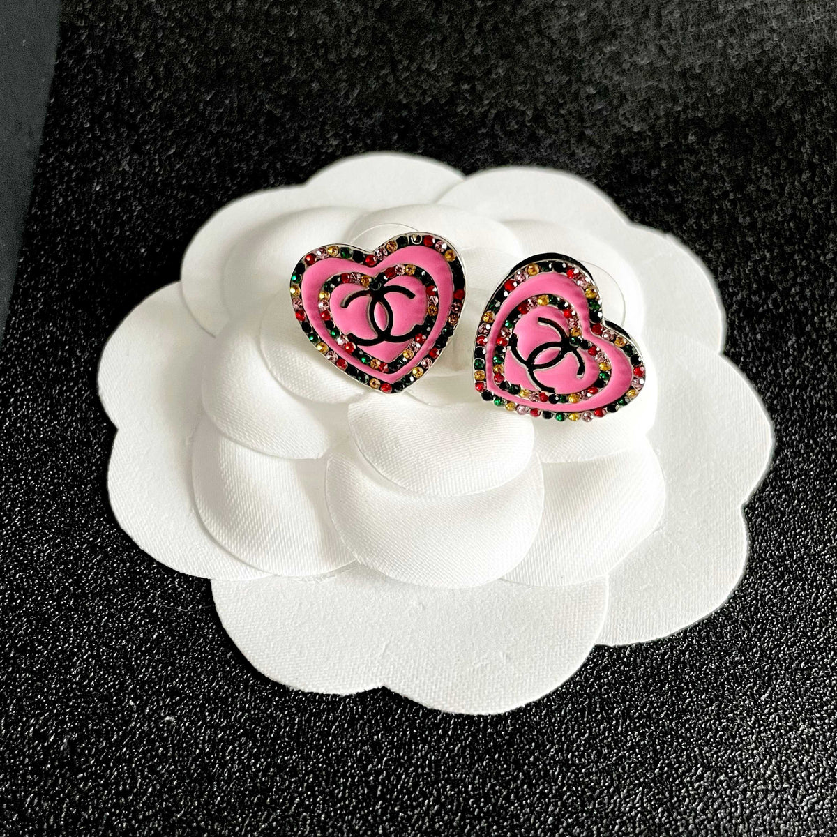 Martin Graham stud earrings in polished metal-tone – front product view