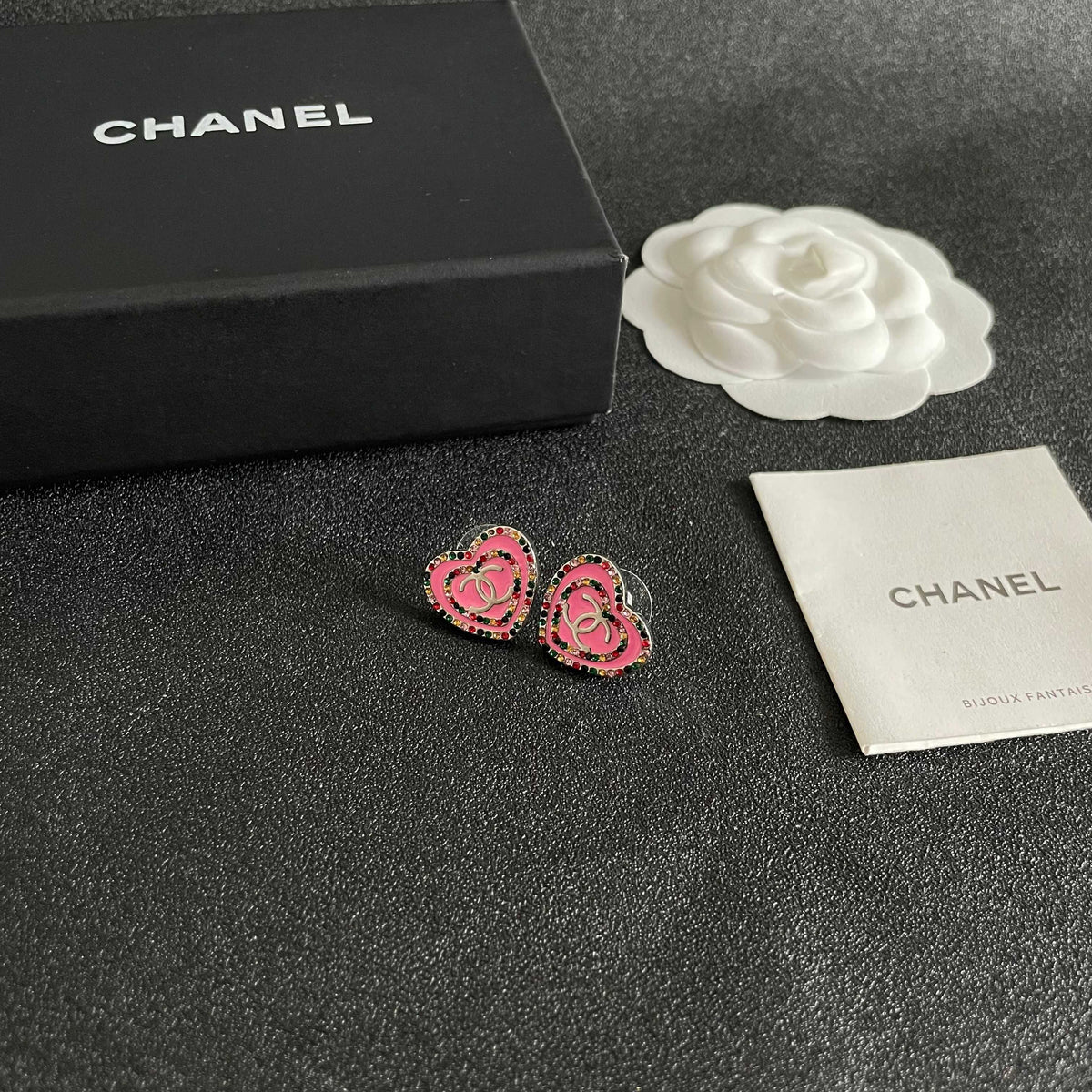 Martin Graham stud earrings in polished metal-tone – styled product view