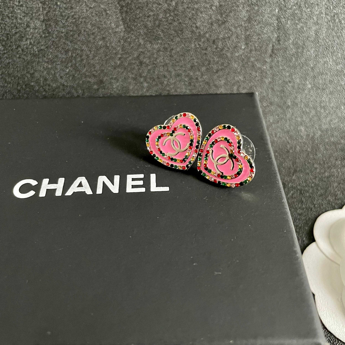 Martin Graham stud earrings in polished metal-tone – detail view
