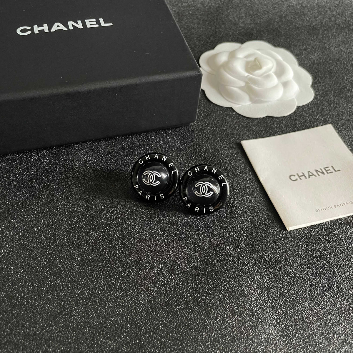 Martin Graham stud earrings in polished metal-tone – styled product view