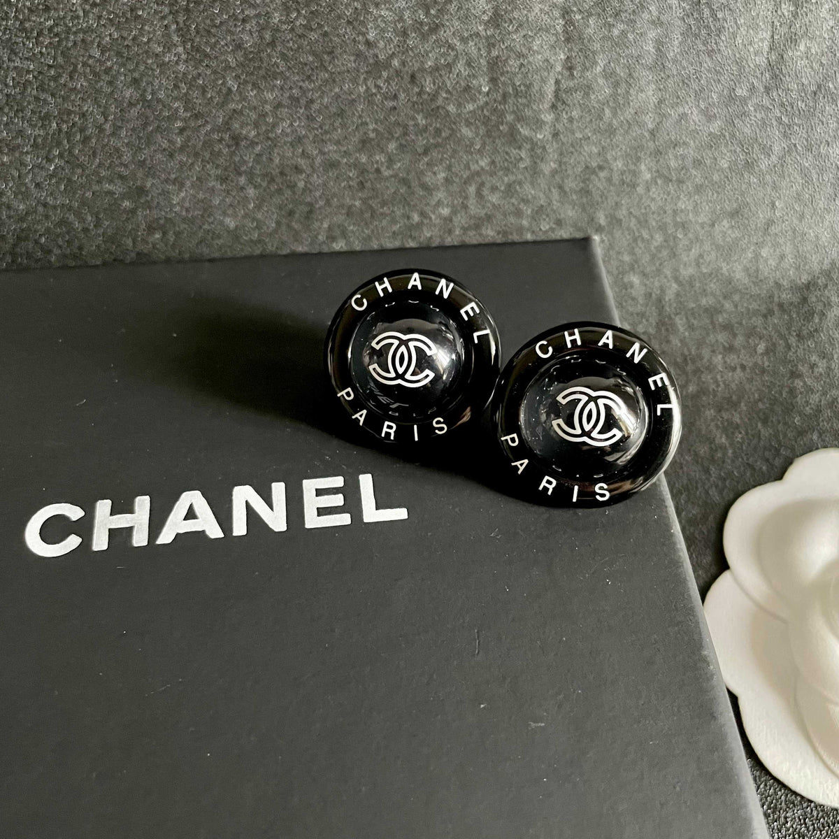 Martin Graham stud earrings in polished metal-tone – detail view