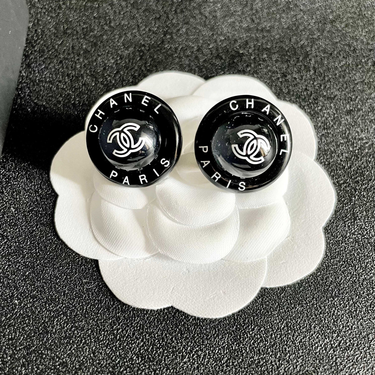 Martin Graham stud earrings in polished metal-tone – front product view