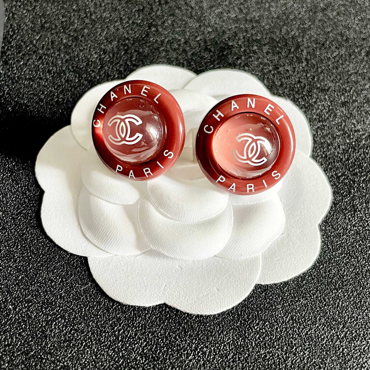 Martin Graham stud earrings in polished metal-tone – front product view