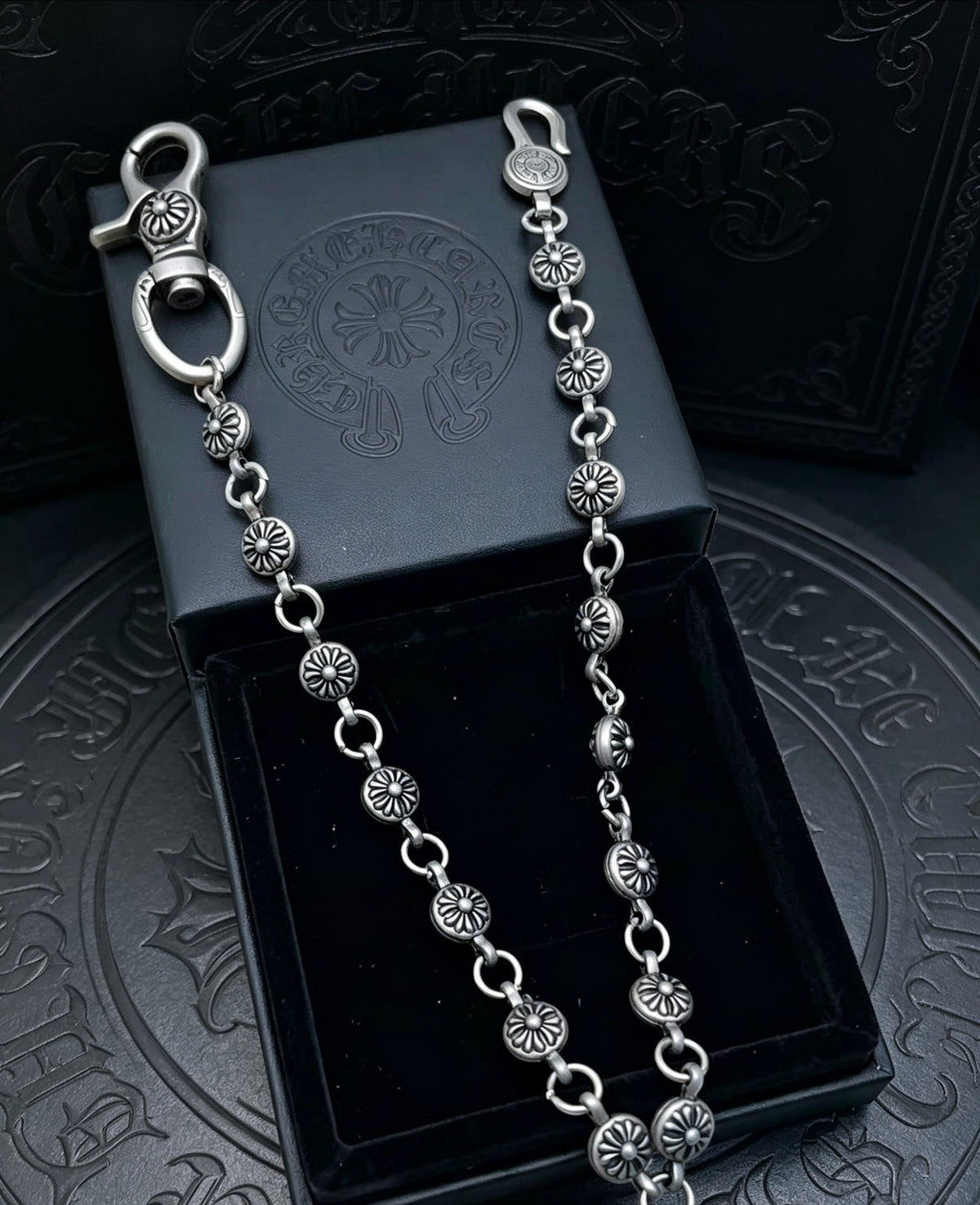 Martin Graham pendant necklace in polished metal-tone – side detail