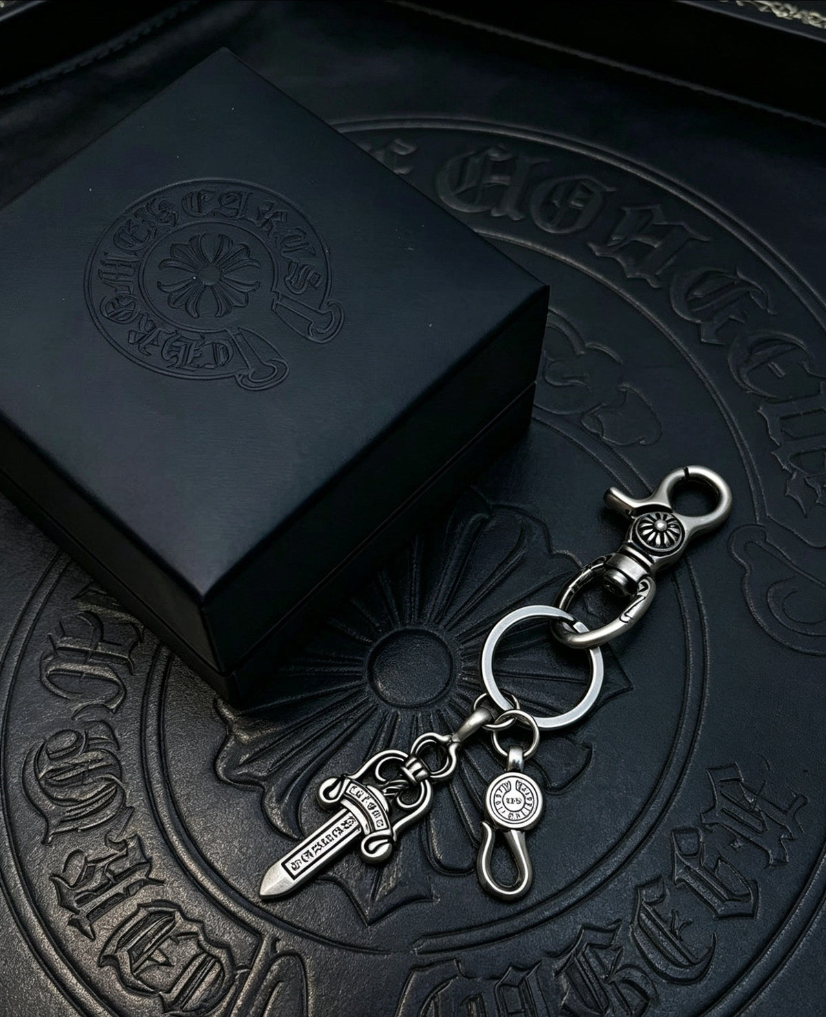 Martin Graham chain accessory in polished metal-tone – side detail
