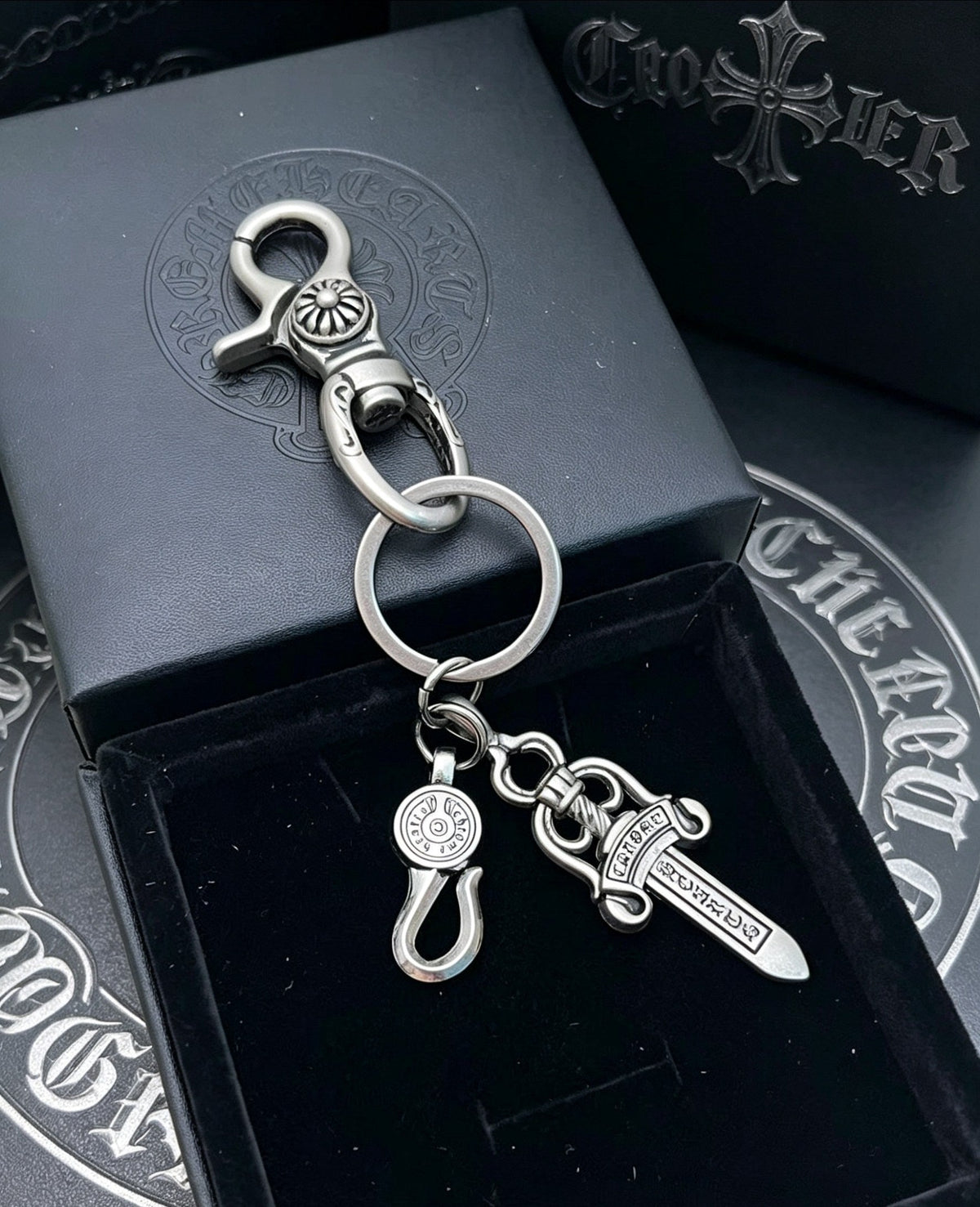 Martin Graham chain accessory in polished metal-tone – detail view