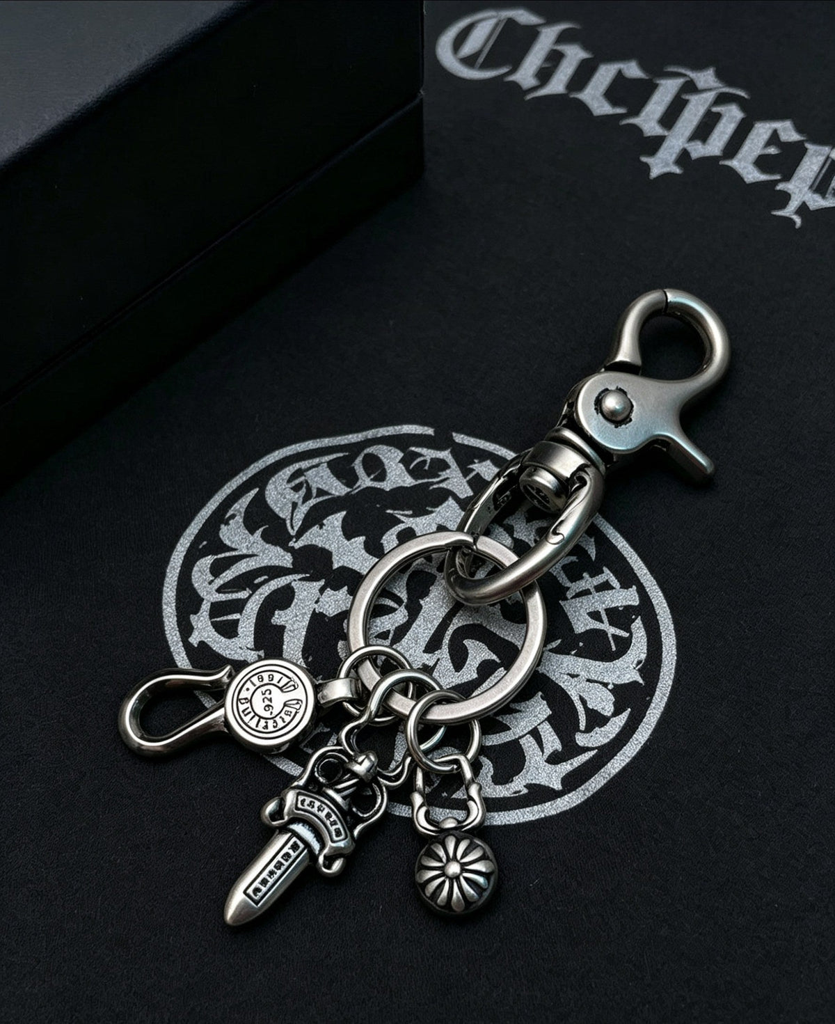 Martin Graham chain accessory in polished metal-tone – detail view