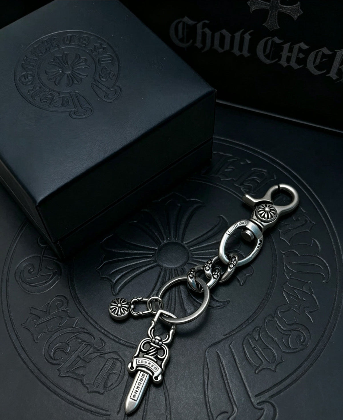 Martin Graham chain accessory in polished metal-tone – side detail