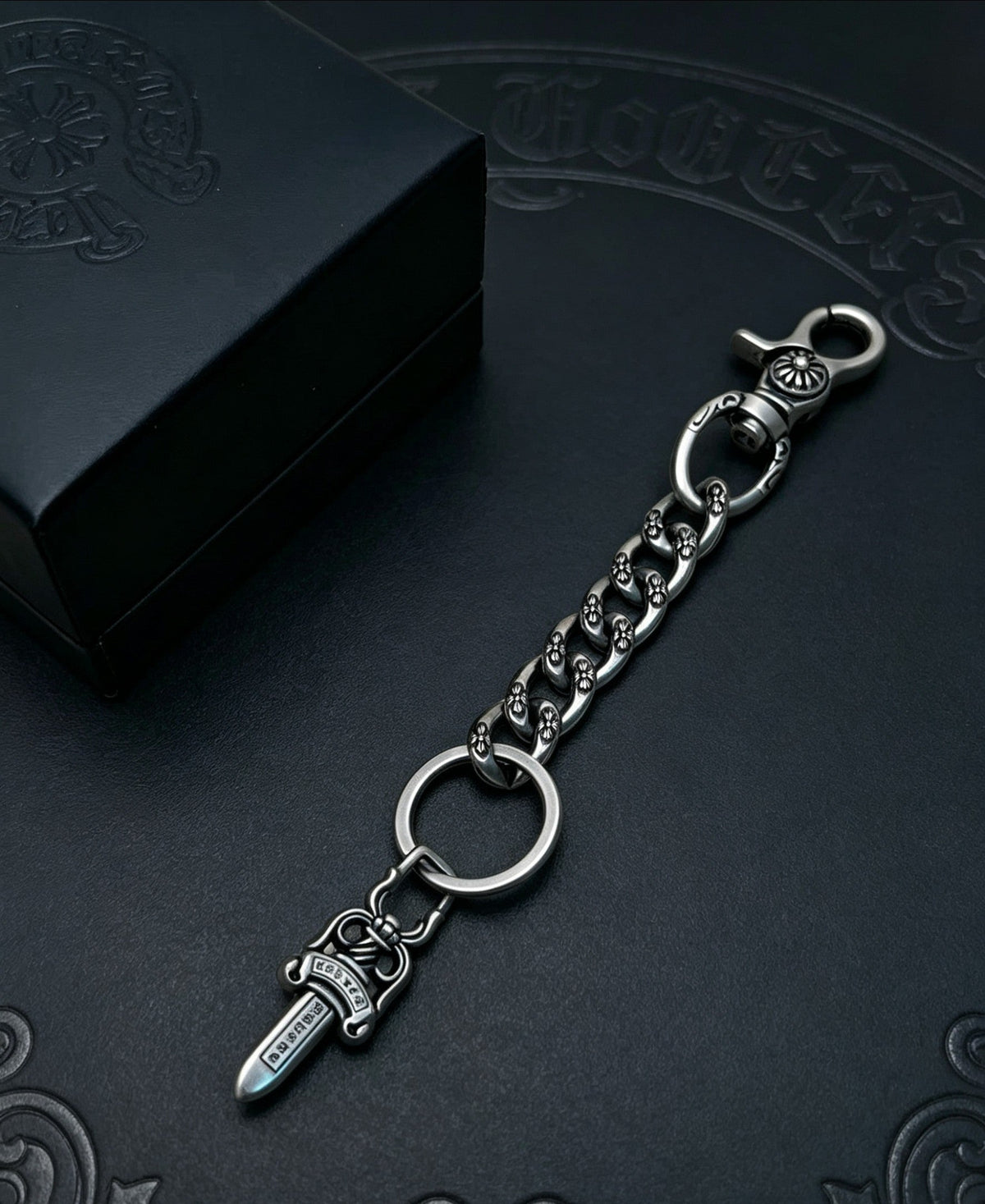 Martin Graham chain accessory in polished metal-tone – side detail