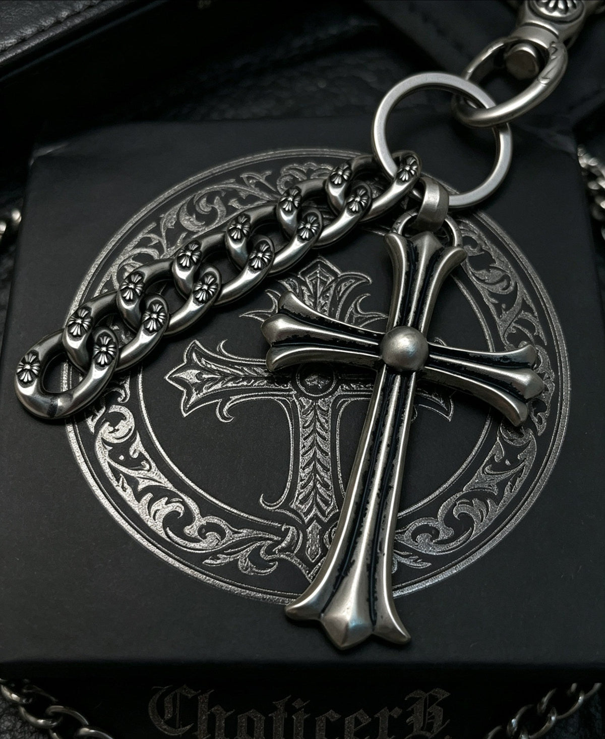 Martin Graham chain accessory in polished metal-tone – close-up detail