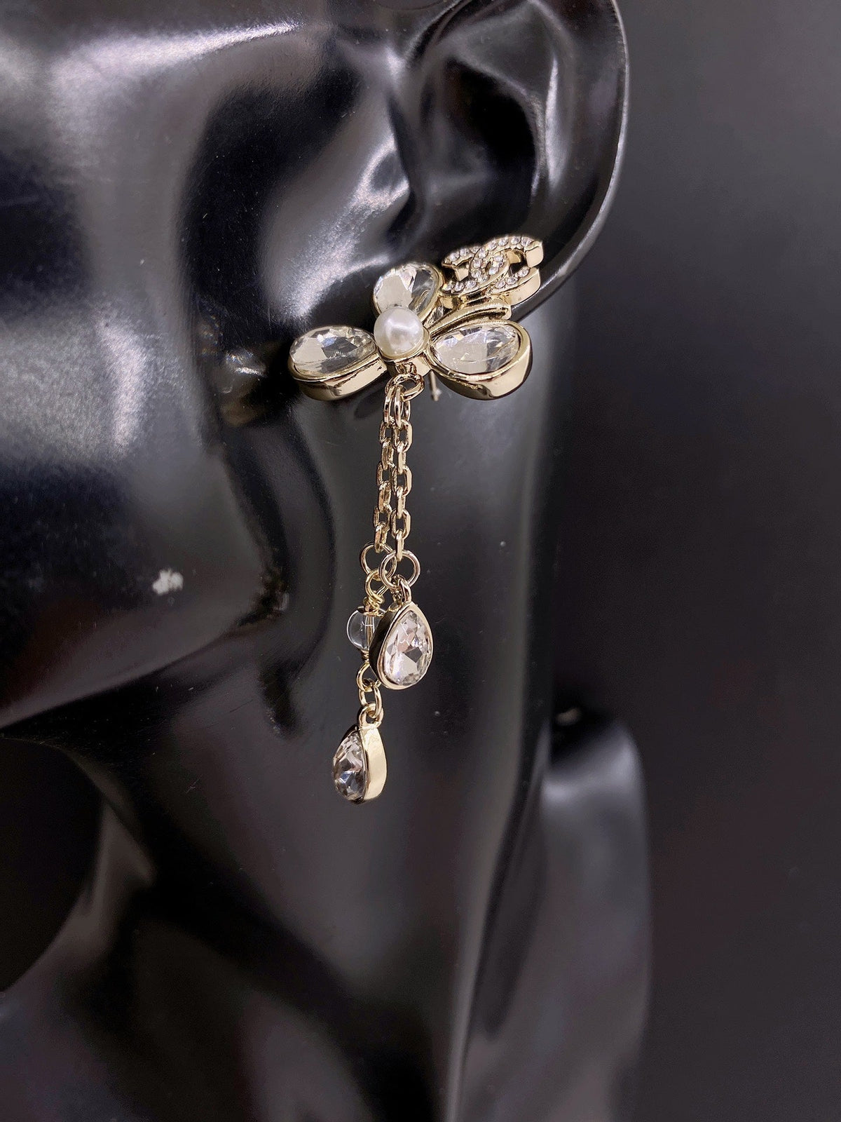 Martin Graham earrings in polished metal-tone – front product view