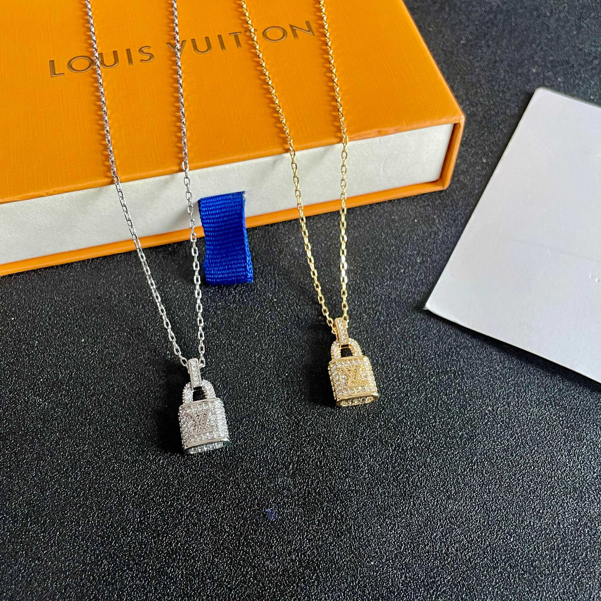 Martin Graham pendant necklace in polished metal-tone – close-up detail