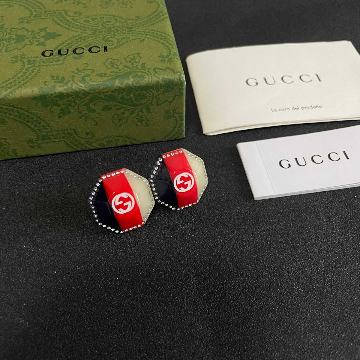 Martin Graham stud earrings in polished metal-tone – styled product view
