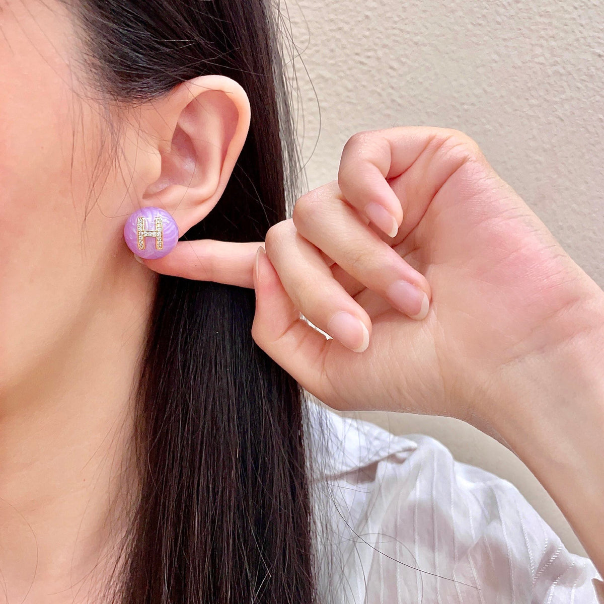 Martin Graham earrings in polished metal-tone – front product view