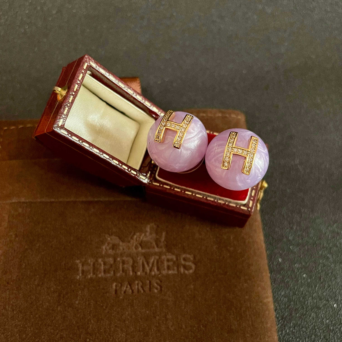 Martin Graham earrings in polished metal-tone – front product view