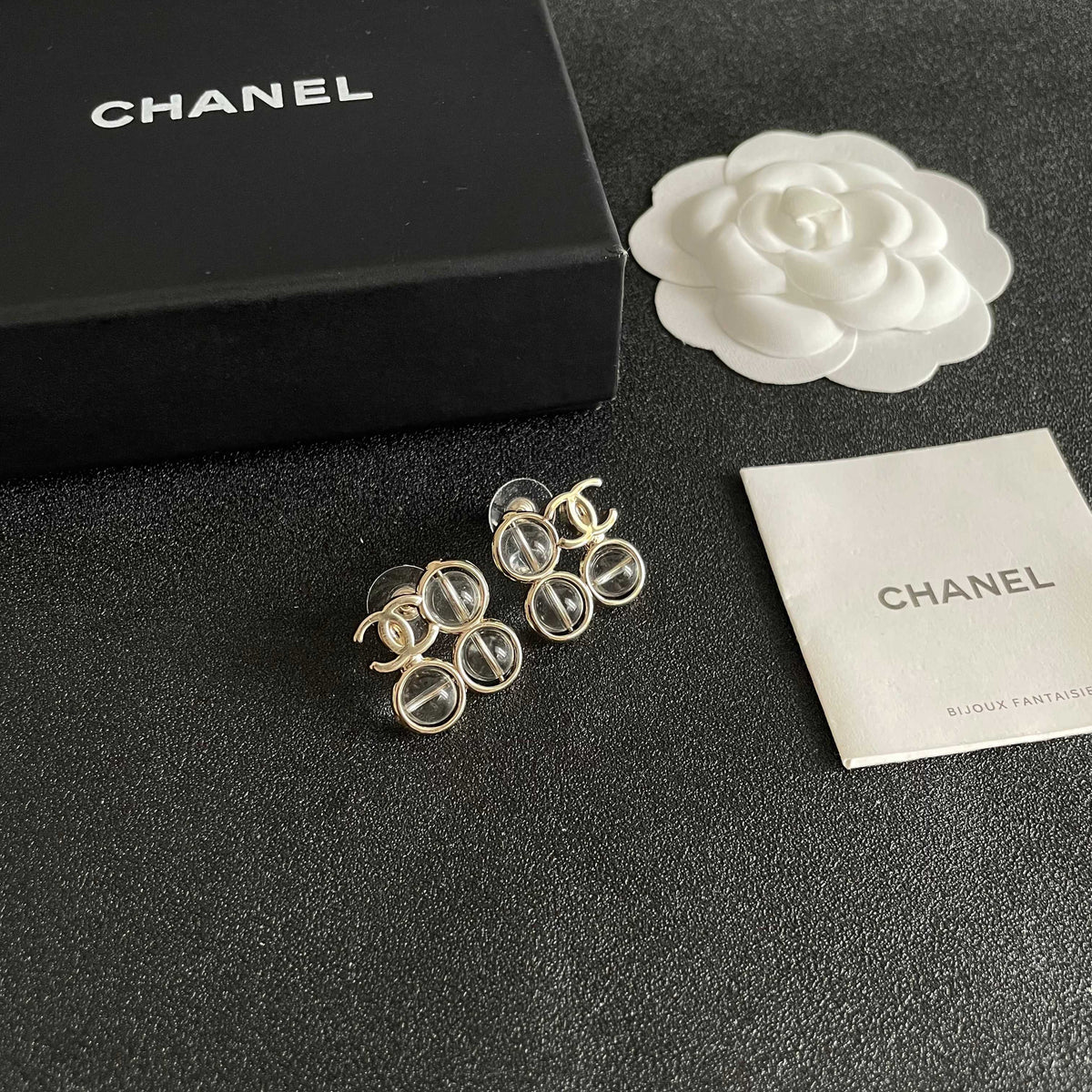 Martin Graham stud earrings in polished metal-tone – styled product view
