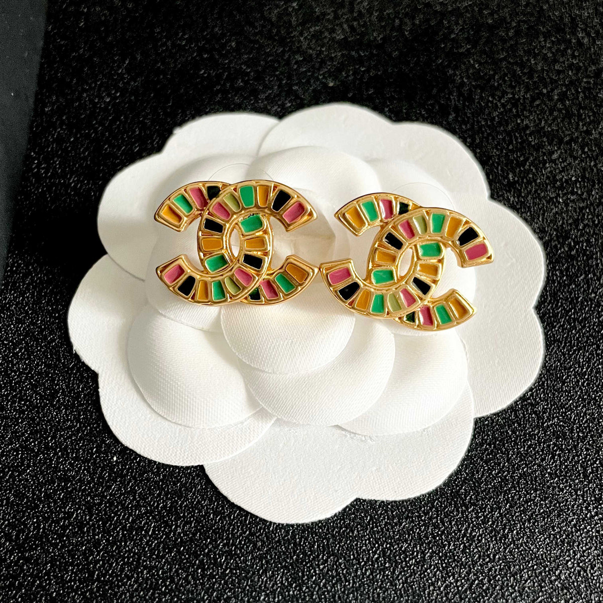 Martin Graham stud earrings in polished metal-tone – front product view