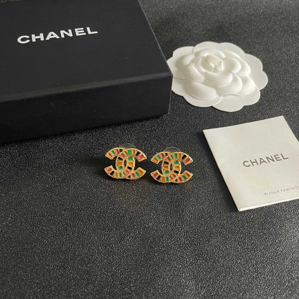 Martin Graham stud earrings in polished metal-tone – styled product view