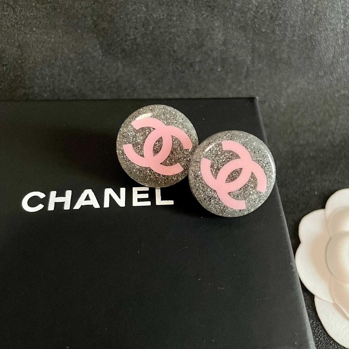 Martin Graham stud earrings in polished metal-tone – detail view