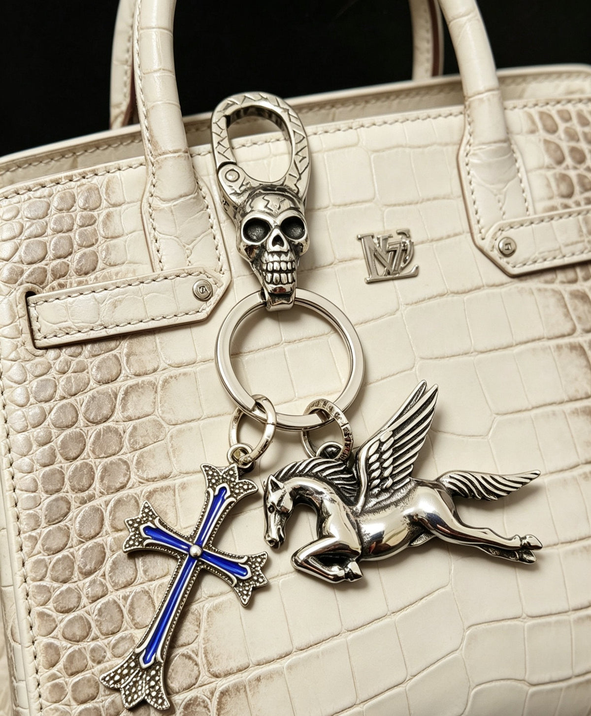 Martin Graham keychain in polished metal-tone – detail view