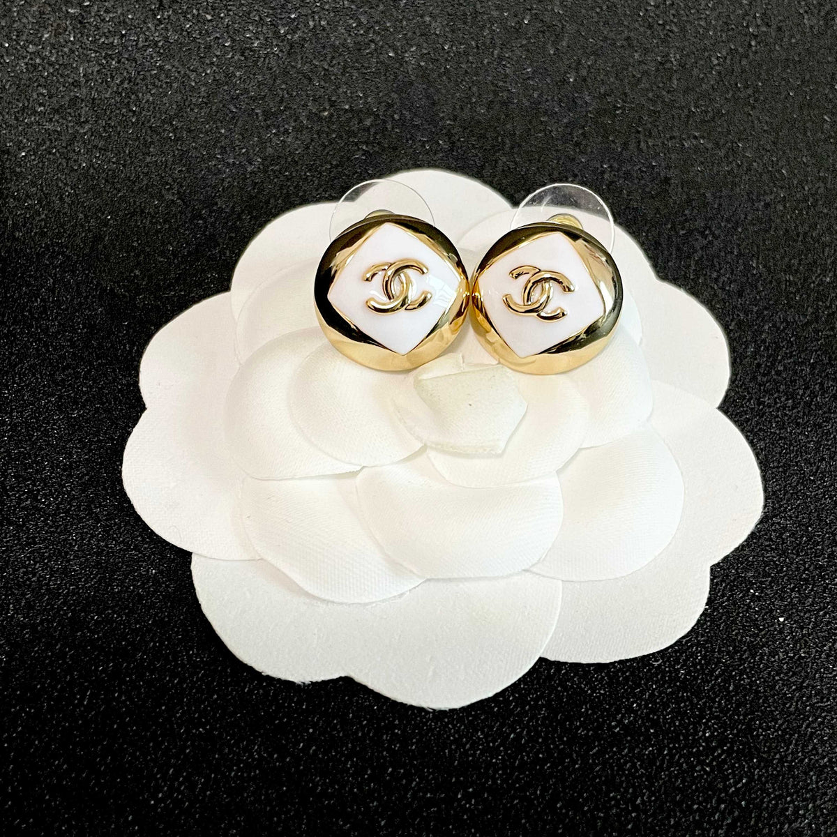 Martin Graham stud earrings in polished metal-tone – front product view