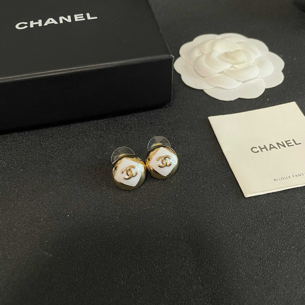Martin Graham stud earrings in polished metal-tone – styled product view