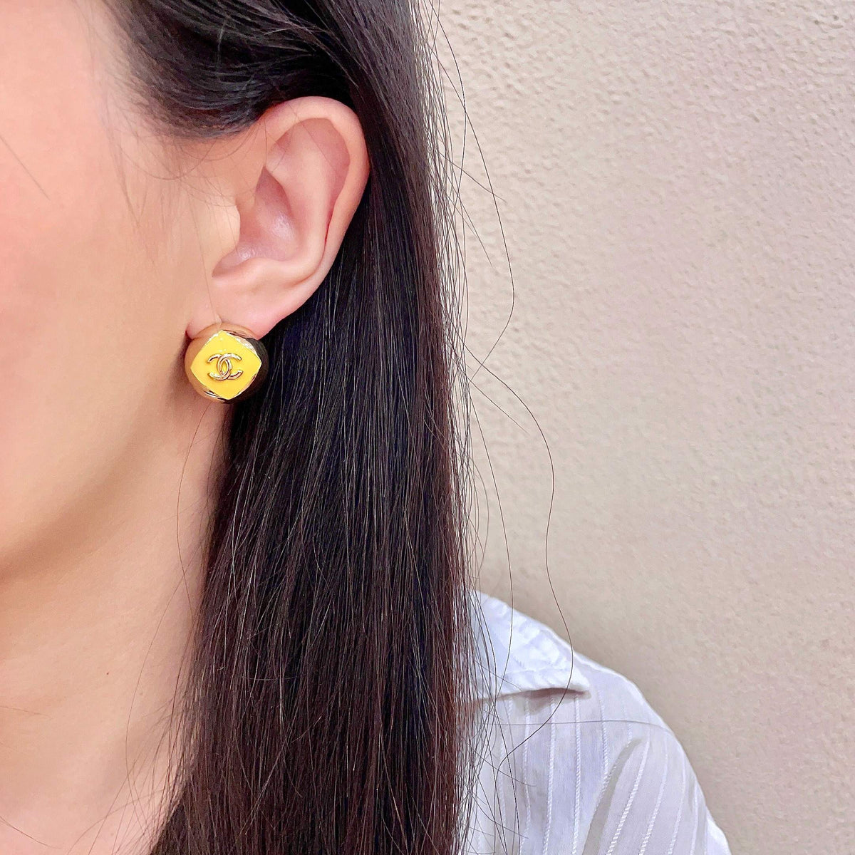Martin Graham stud earrings in polished metal-tone – detail view