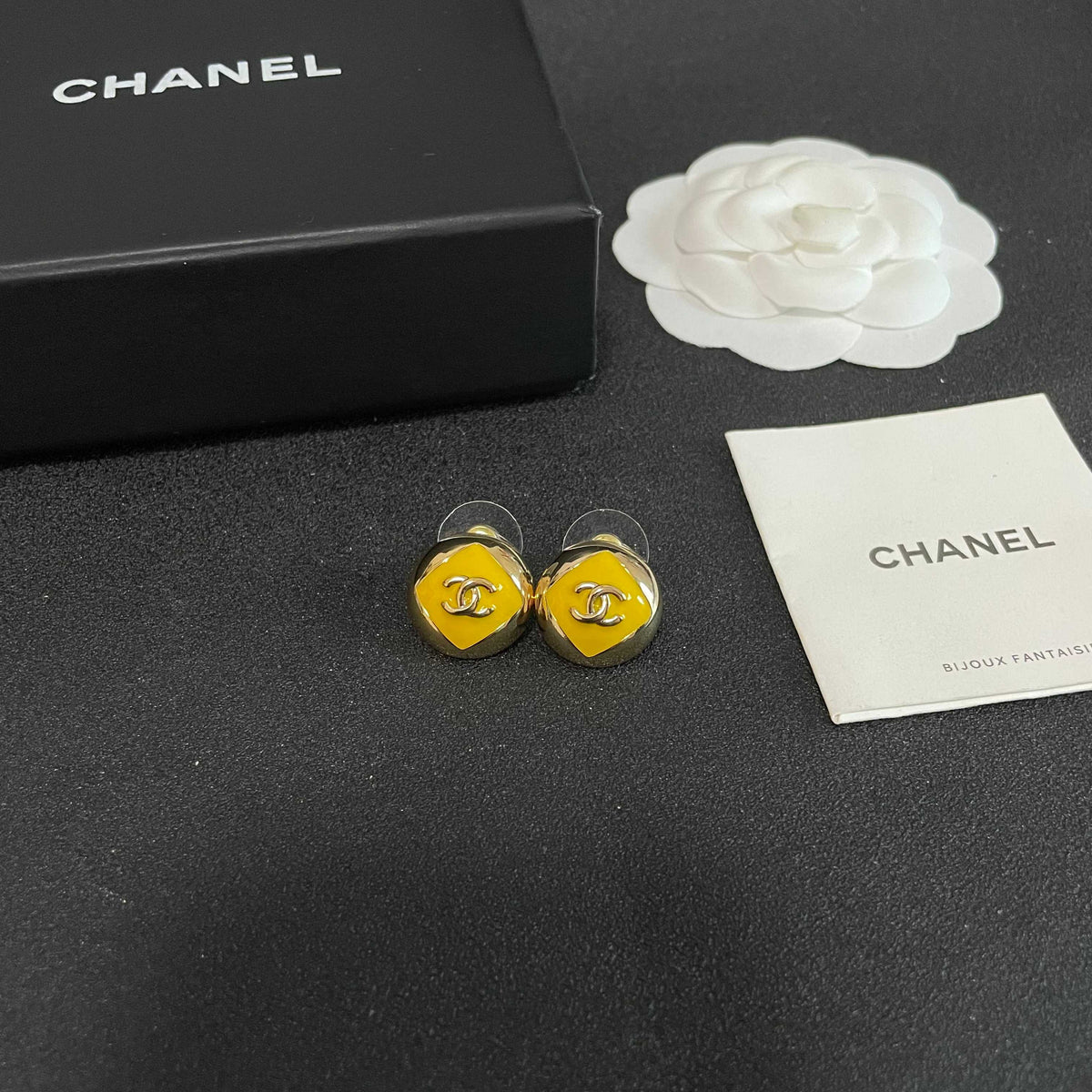 Martin Graham stud earrings in polished metal-tone – styled product view