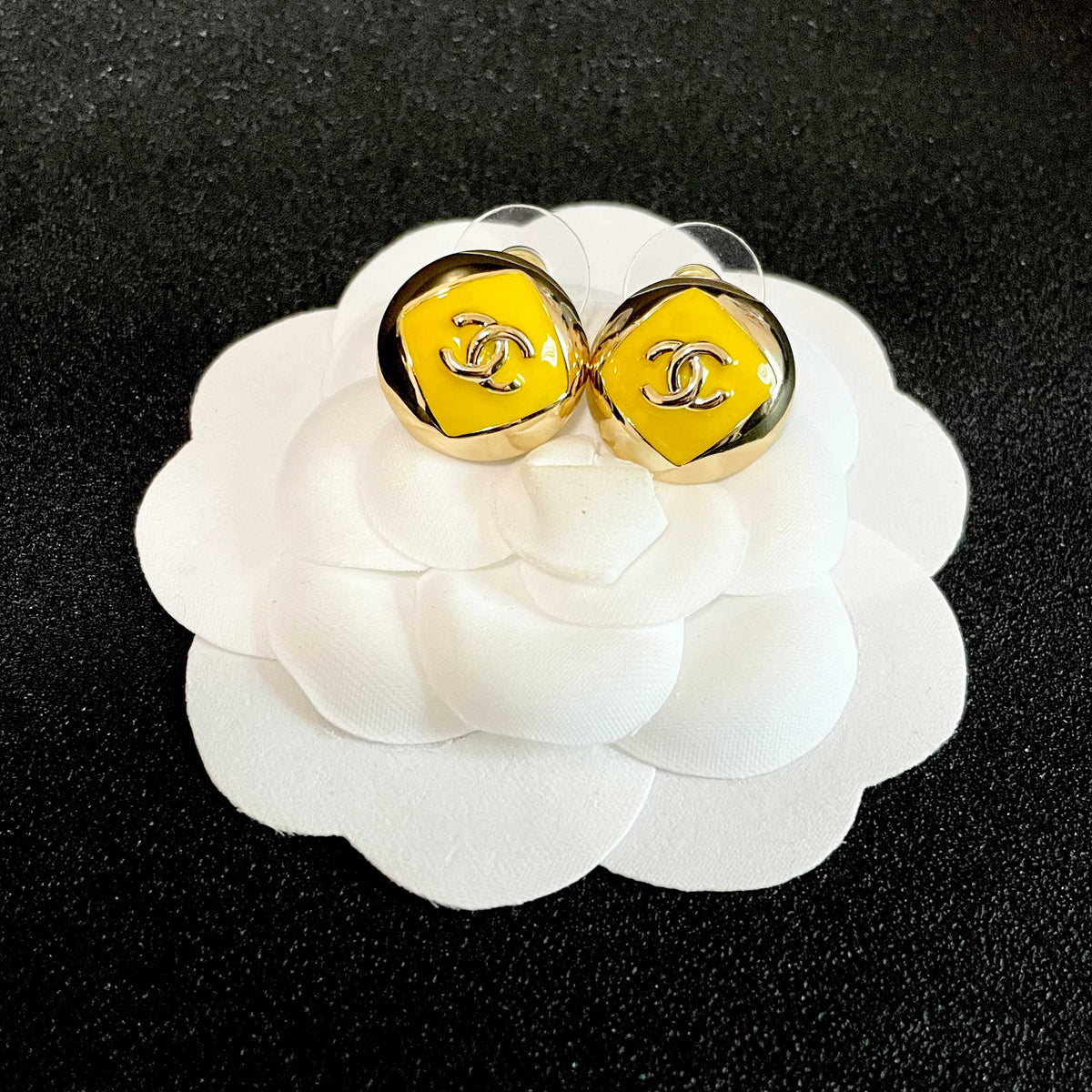 Martin Graham stud earrings in polished metal-tone – front product view